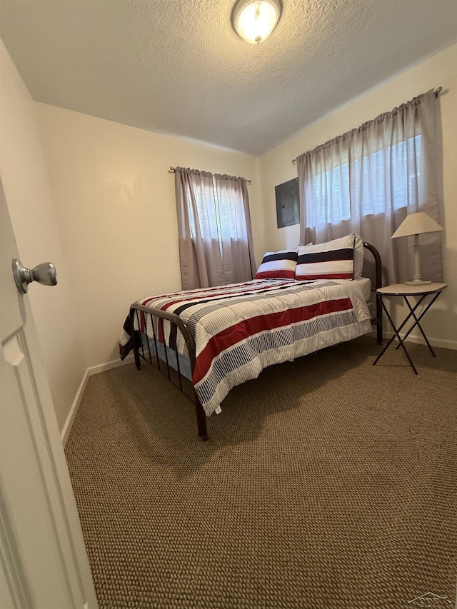 578 W Houghton Lake Dr, Prudenville, MI 48651 - bedroom featuring carpet floors and a textured ceiling