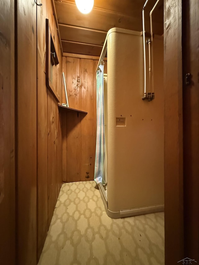 578 W Houghton Lake Dr, Prudenville, MI 48651 - hallway featuring wood walls
