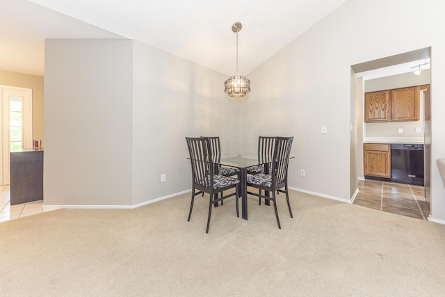 492 Colin Cir, Ann Arbor, MI 48103 - dining space with light colored carpet, a chandelier, and lofted ceiling