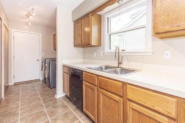 492 Colin Cir, Ann Arbor, MI 48103 - kitchen featuring washing machine and dryer, black dishwasher, light countertops, and light tile patterned floors
