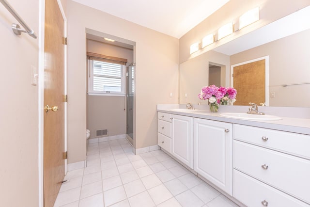 492 Colin Cir, Ann Arbor, MI 48103 - full bathroom featuring double vanity, a shower stall, and tile patterned flooring