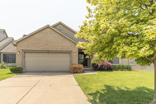 492 Colin Cir, Ann Arbor, MI 48103 - view of front of property featuring brick siding, a garage, concrete driveway, and a front yard