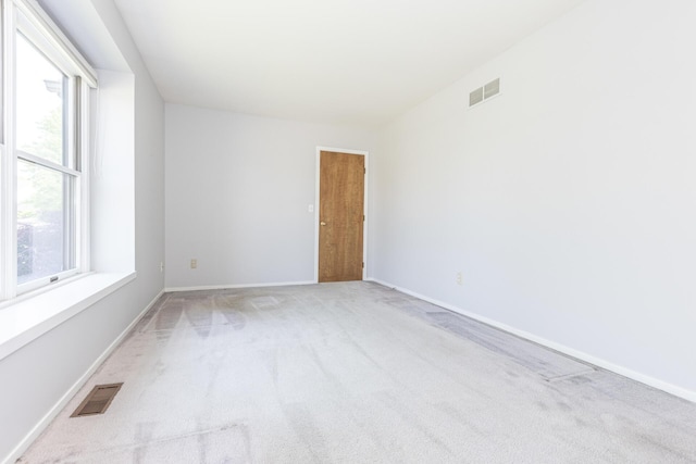 492 Colin Cir, Ann Arbor, MI 48103 - spare room featuring light carpet and baseboards