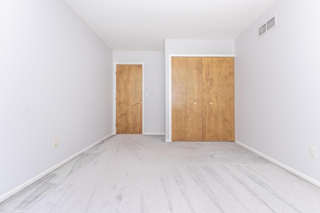 492 Colin Cir, Ann Arbor, MI 48103 - unfurnished bedroom featuring carpet flooring and a closet