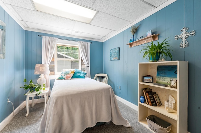 283 W 16th St, Baldwin, MI 49304 - carpeted bedroom with wooden walls