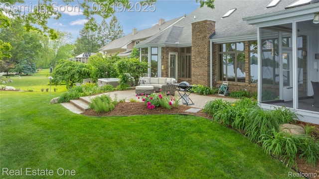 2505 Cedar Key Dr, Lake Orion, MI 48360 - view of green lawn featuring a patio area, a sunroom, and an outdoor living space