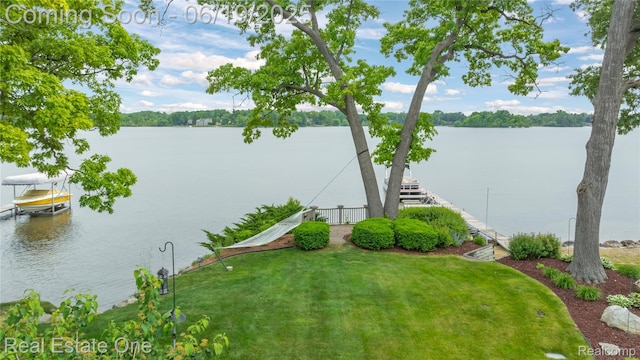 2505 Cedar Key Dr, Lake Orion, MI 48360 - water view with a floating dock