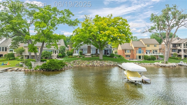 2505 Cedar Key Dr, Lake Orion, MI 48360 - water view with nearby suburban area, boat lift, and a boat dock