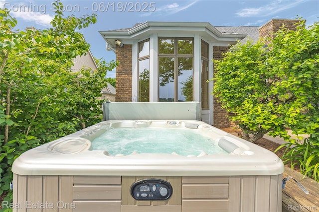 2505 Cedar Key Dr, Lake Orion, MI 48360 - view of patio / terrace with a hot tub