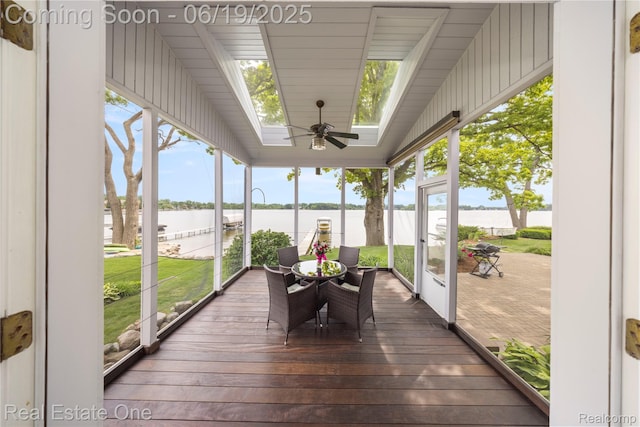 2505 Cedar Key Dr, Lake Orion, MI 48360 - sunroom / solarium featuring a water view, ceiling fan, and a skylight