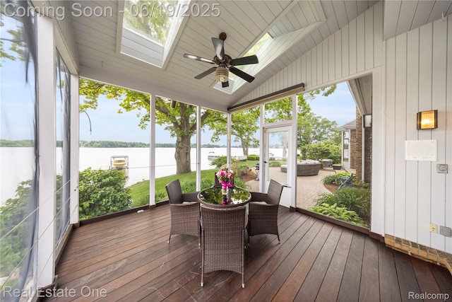 2505 Cedar Key Dr, Lake Orion, MI 48360 - sunroom with a water view, a skylight, lofted ceiling, ceiling fan, and outdoor dining area