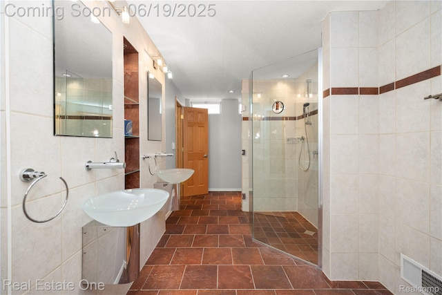 2505 Cedar Key Dr, Lake Orion, MI 48360 - bathroom featuring a stall shower and a sink