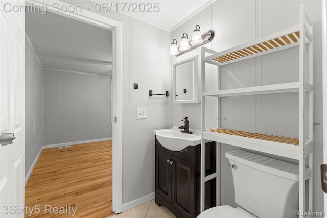 36513 Evans St, New Boston, MI 48164 - bathroom featuring vanity and wood finished floors