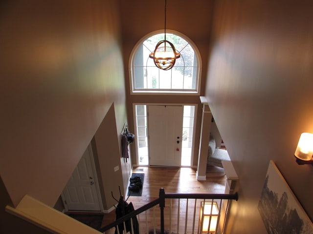 1995 Frances Way, Ypsilanti, MI 48198 - entrance foyer with a high ceiling, wood finished floors, and stairs