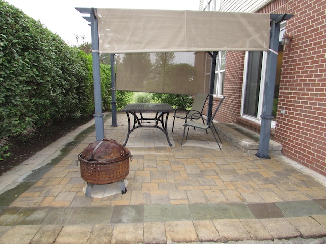 1995 Frances Way, Ypsilanti, MI 48198 - view of patio / terrace featuring an outdoor fire pit