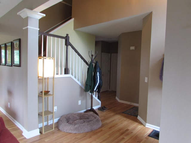 1995 Frances Way, Ypsilanti, MI 48198 - staircase with wood finished floors and decorative columns