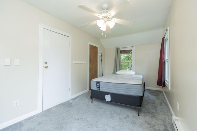 318 Cecil St, Buchanan, MI 49107 - bedroom featuring baseboard heating, carpet, lofted ceiling, and ceiling fan