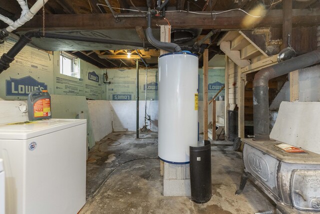 318 Cecil St, Buchanan, MI 49107 - below grade area featuring water heater and washer / dryer