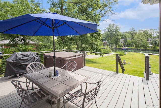 22085 Thorofare Rd, Grosse Ile, MI 48138 - wooden deck with a hot tub, outdoor dining area, a yard, and grilling area