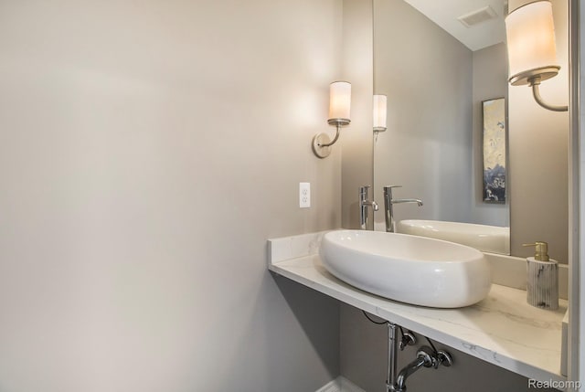 22085 Thorofare Rd, Grosse Ile, MI 48138 - bathroom featuring a sink