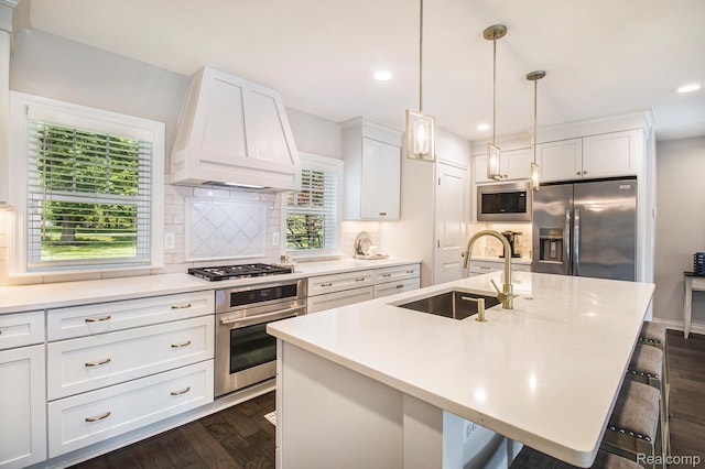 22085 Thorofare Rd, Grosse Ile, MI 48138 - kitchen featuring stainless steel appliances, custom exhaust hood, a kitchen bar, tasteful backsplash, and recessed lighting