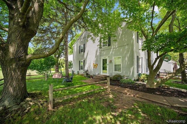 17013 Smugglers Cove St, Clinton Township, MI 48038 - view of front of house with a front yard