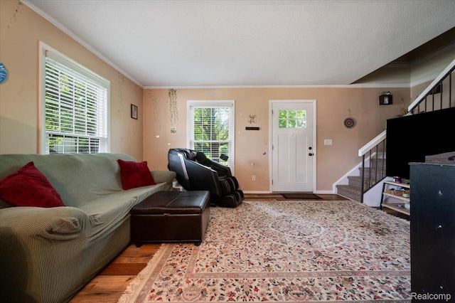 17013 Smugglers Cove St, Clinton Township, MI 48038 - living room with stairway, crown molding, and wood finished floors