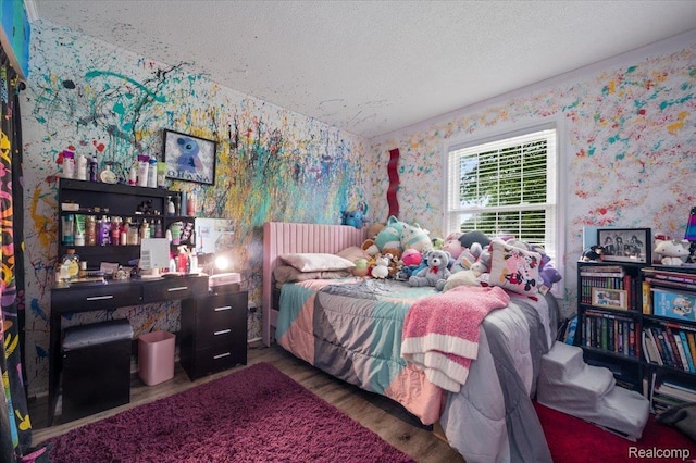 17013 Smugglers Cove St, Clinton Township, MI 48038 - bedroom featuring wallpapered walls, a textured ceiling, and wood finished floors