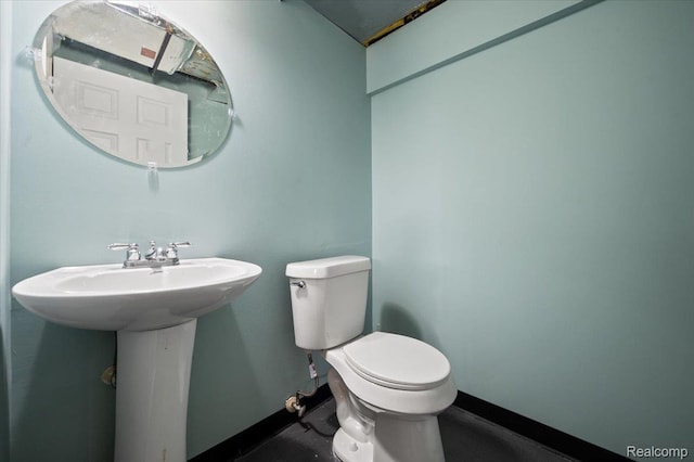 17013 Smugglers Cove St, Clinton Township, MI 48038 - bathroom with toilet and baseboards
