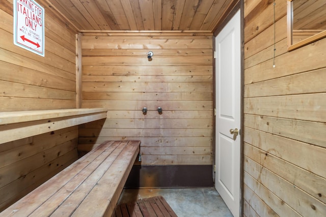3125 Fawn Ln, Jackson, MI 49201 - sauna with wooden walls, wood ceiling, and unfinished concrete flooring