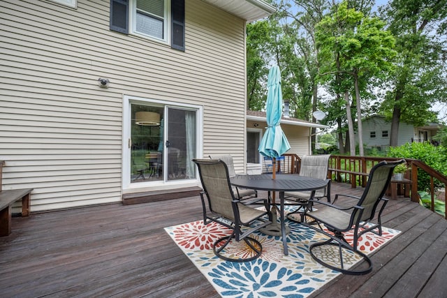 3125 Fawn Ln, Jackson, MI 49201 - deck featuring outdoor dining area