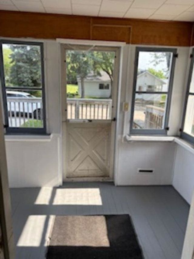 1431 Cleveland St, Owosso, MI 48867 - doorway to outside with a paneled ceiling