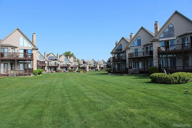 50703 Harbour View Dr N, New Baltimore, MI 48047 - surrounding community featuring a residential view and a yard