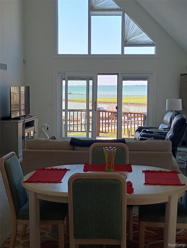50703 Harbour View Dr N, New Baltimore, MI 48047 - dining space featuring a high ceiling and healthy amount of natural light