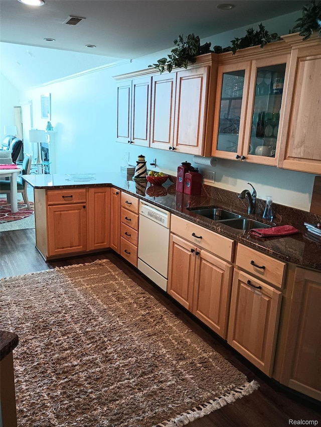 50703 Harbour View Dr N, New Baltimore, MI 48047 - kitchen featuring dishwasher, dark wood-type flooring, dark stone counters, glass insert cabinets, and a peninsula