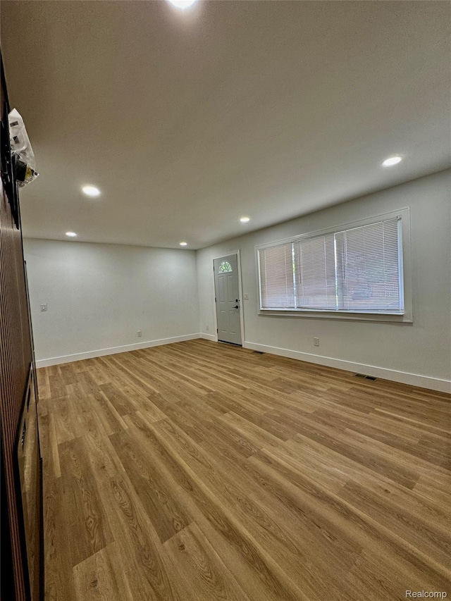 297 W Yale Ave, Pontiac, MI 48340 - spare room featuring wood finished floors and recessed lighting