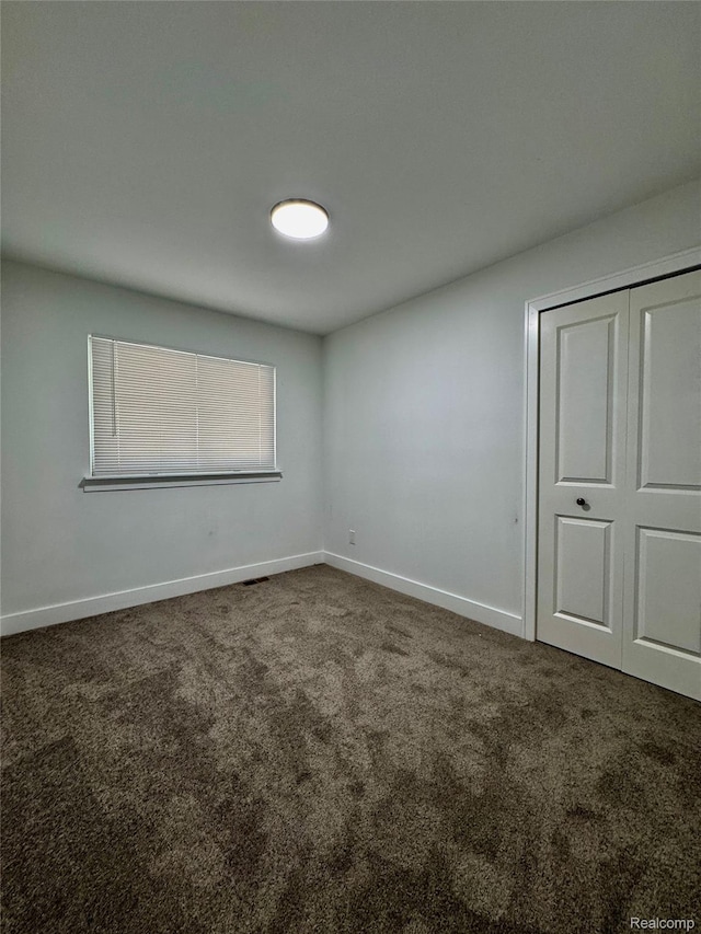 297 W Yale Ave, Pontiac, MI 48340 - carpeted spare room featuring baseboards