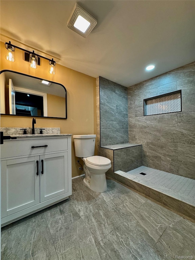 297 W Yale Ave, Pontiac, MI 48340 - bathroom with a tile shower, vanity, and recessed lighting