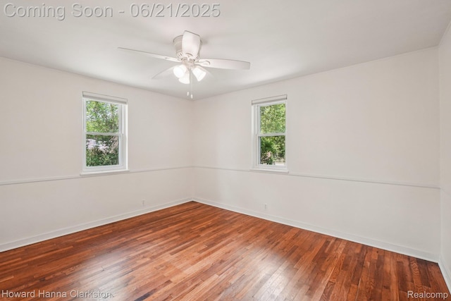 5766 Corunna Ave, Clarkston, MI 48346 - unfurnished room featuring healthy amount of natural light, hardwood / wood-style floors, and ceiling fan