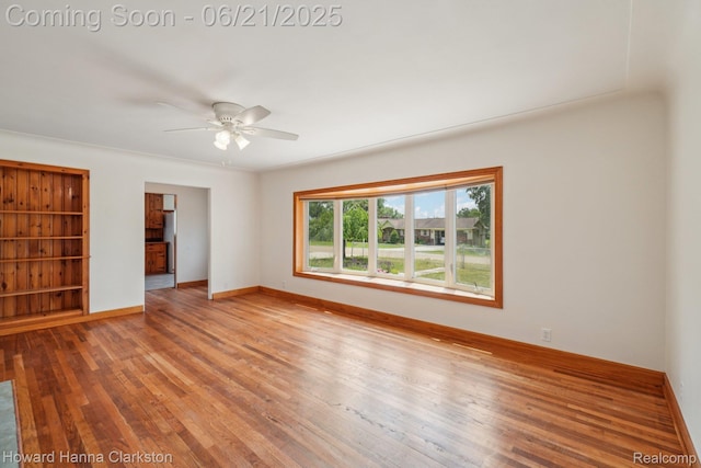 5766 Corunna Ave, Clarkston, MI 48346 - spare room featuring a ceiling fan and light wood-type flooring