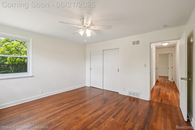 5766 Corunna Ave, Clarkston, MI 48346 - unfurnished bedroom with wood finished floors, a closet, and ceiling fan