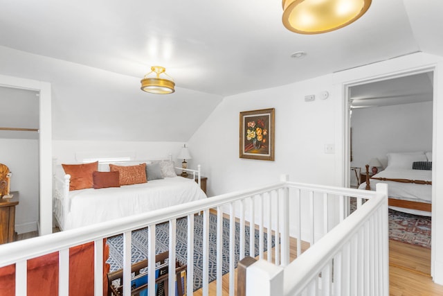 317 Cherry St, South Haven, MI 49090 - bedroom featuring light wood-style flooring and vaulted ceiling