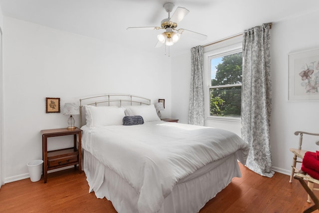 317 Cherry St, South Haven, MI 49090 - bedroom with wood finished floors and ceiling fan