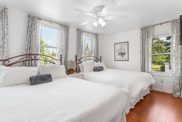 317 Cherry St, South Haven, MI 49090 - bedroom featuring wood finished floors and a ceiling fan