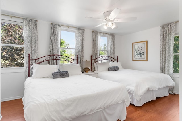 317 Cherry St, South Haven, MI 49090 - bedroom featuring wood finished floors and ceiling fan