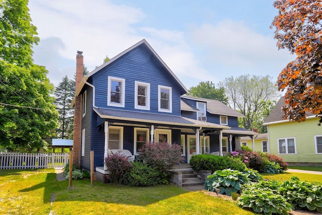 317 Cherry St, South Haven, MI 49090 - view of front of property with a chimney and covered porch