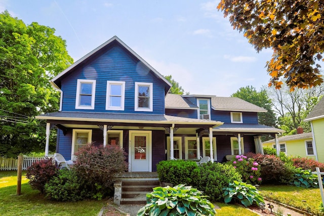 317 Cherry St, South Haven, MI 49090 - view of front facade featuring a porch
