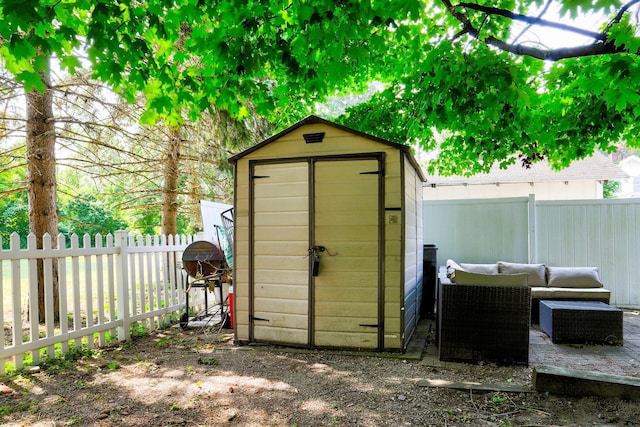 317 Cherry St, South Haven, MI 49090 - view of shed with a fenced backyard and an outdoor hangout area