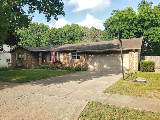424 Leland St, Flushing, MI 48433 - ranch-style home featuring a garage, brick siding, and driveway