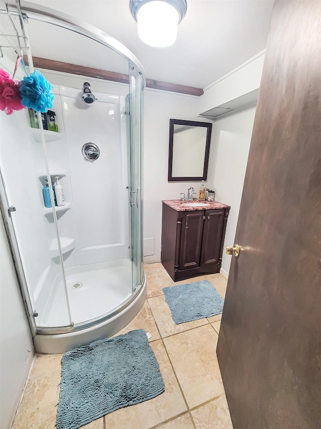 424 Leland St, Flushing, MI 48433 - bathroom featuring a shower stall, vanity, and tile patterned flooring